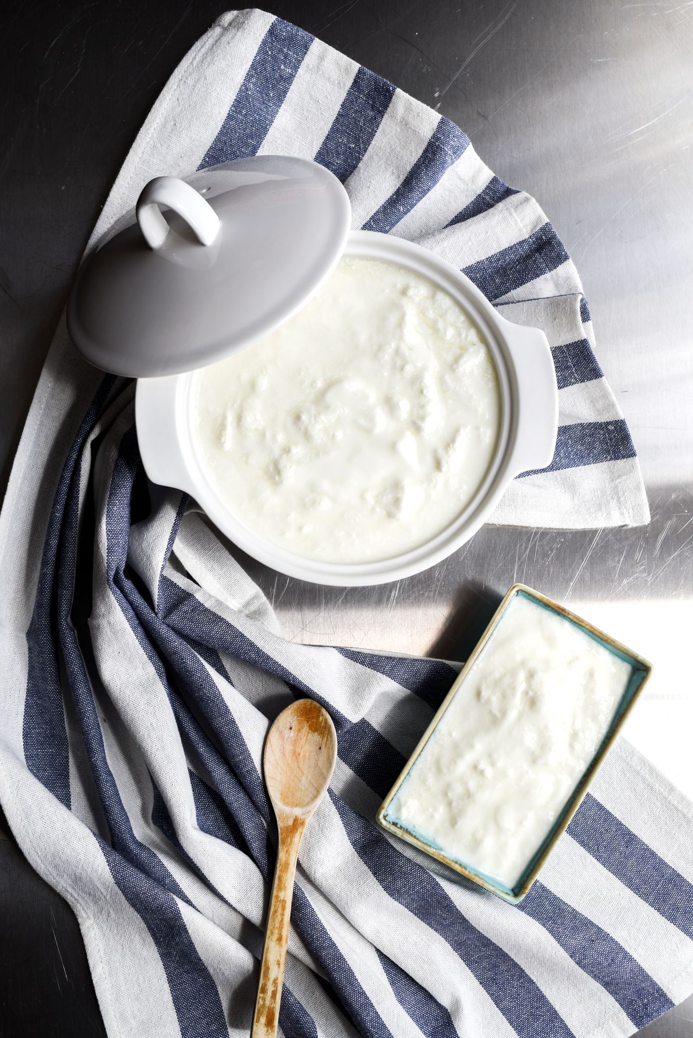 Homemade cultured milk setting in ceramic pots