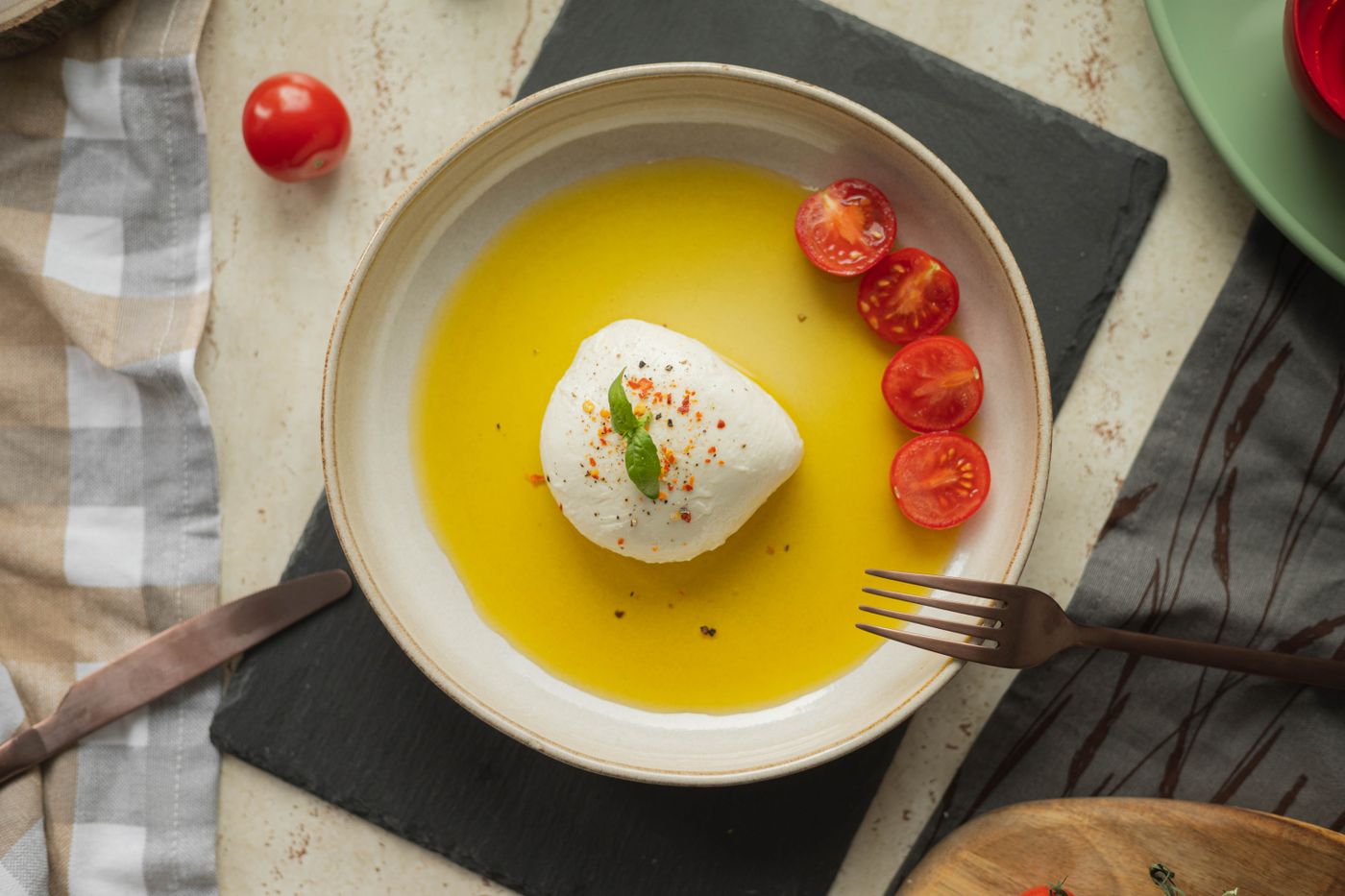 Stretched-curd cheese with tomatoes and basil