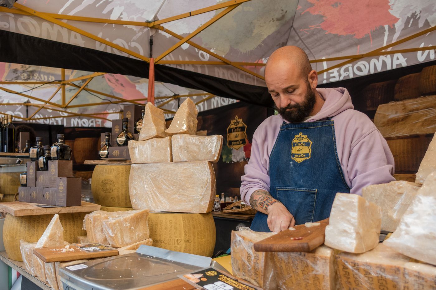 A stall selling Parmigiano Reggiano wheels