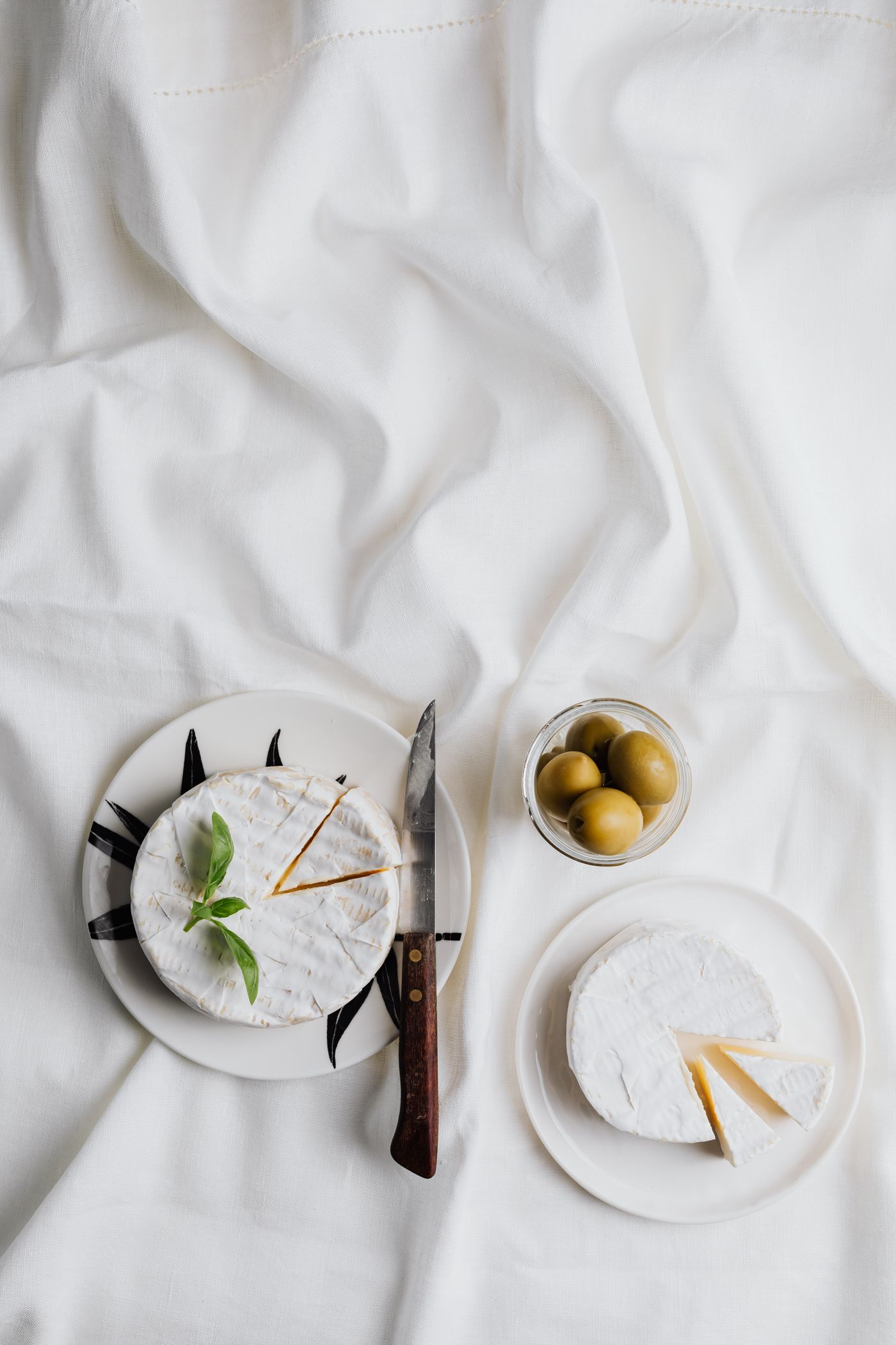 A bloomy-rind soft cheese with a white velvet coat